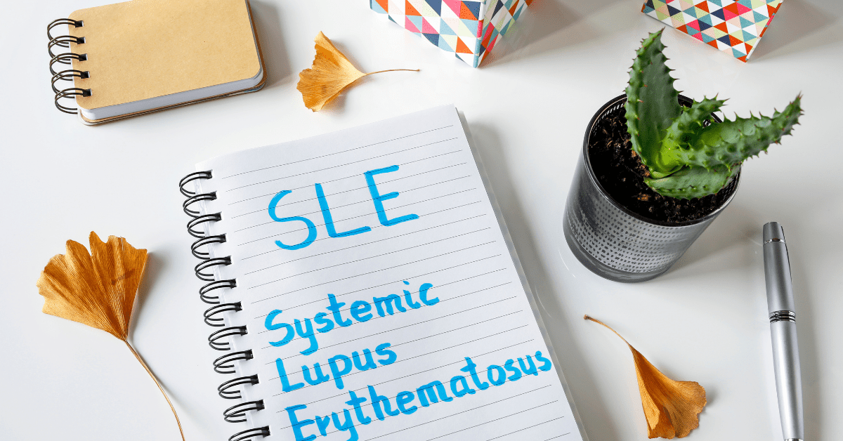 Systemic Lupus Erythematous wrote on a notepad.